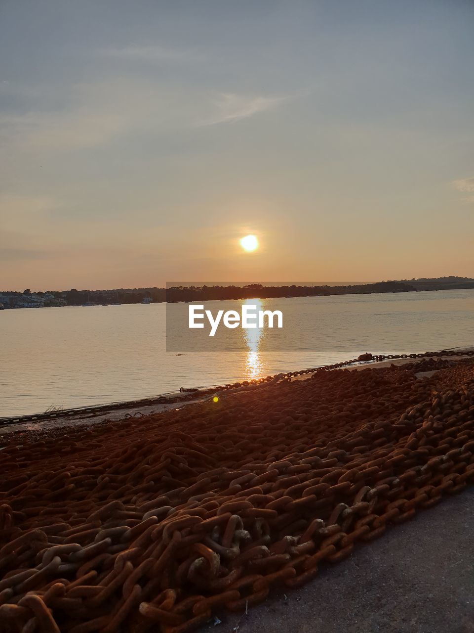 SCENIC VIEW OF SEA DURING SUNSET