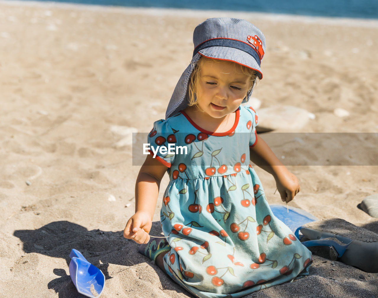 FULL LENGTH OF GIRL ON SAND