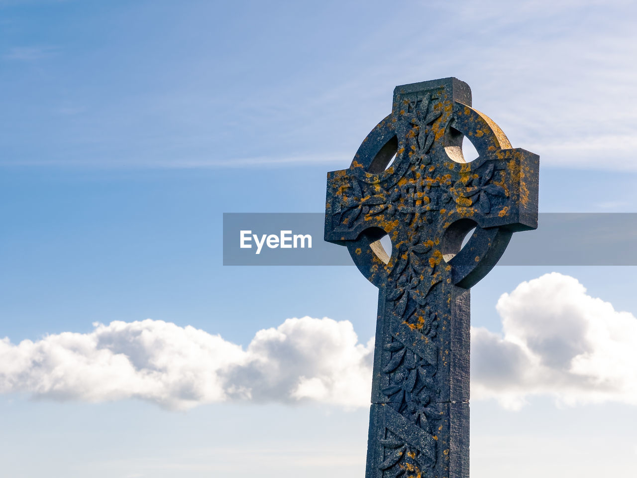 Low angle view of statue against sky