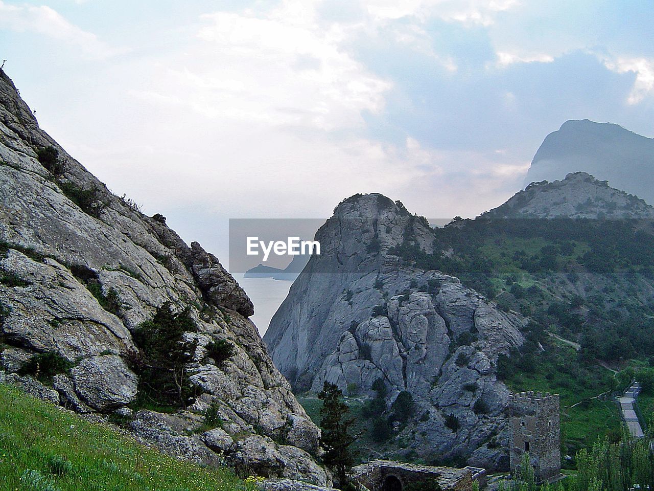 View of rocky mountains against sky