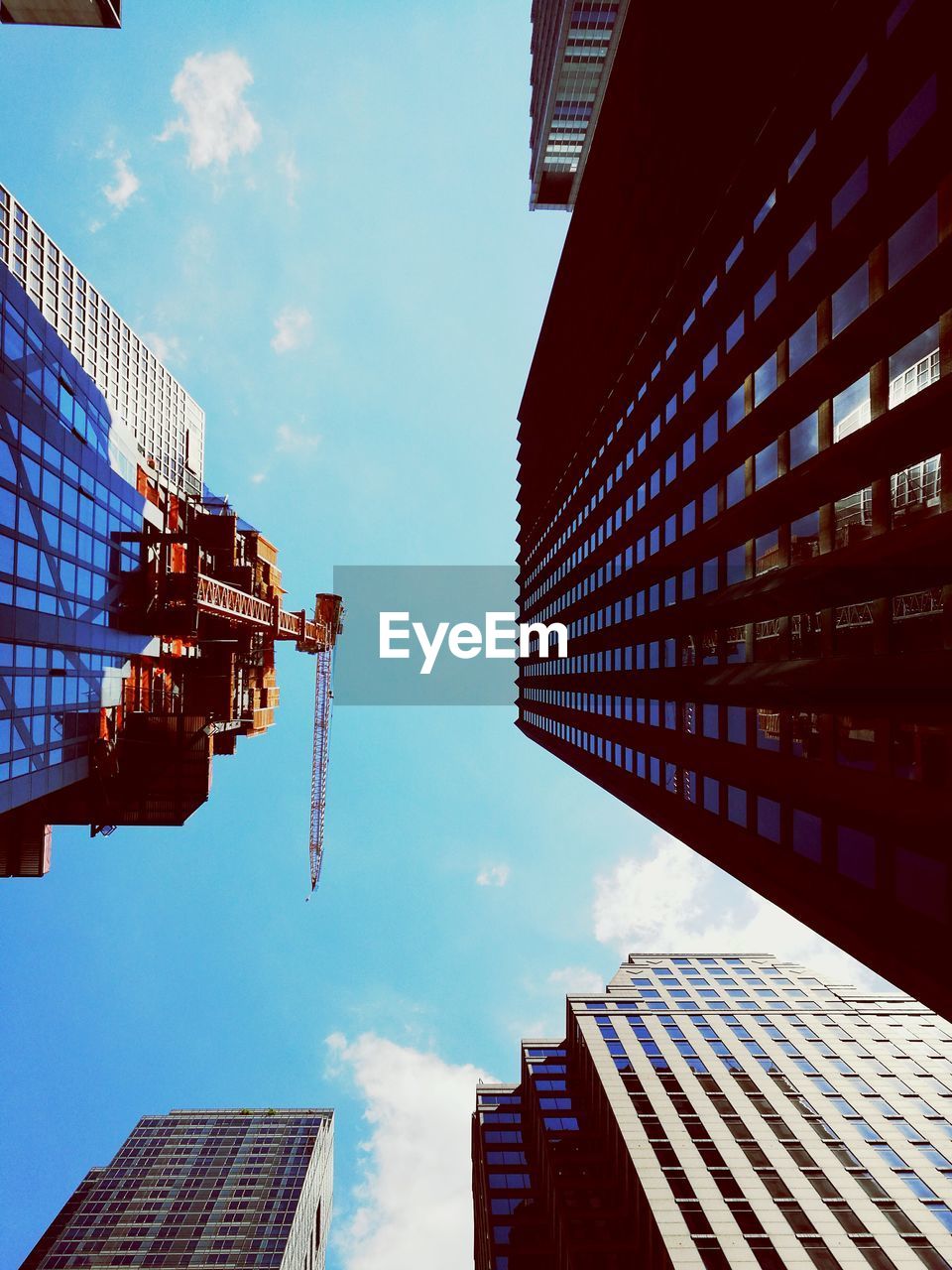 Low angle view of skyscrapers against sky