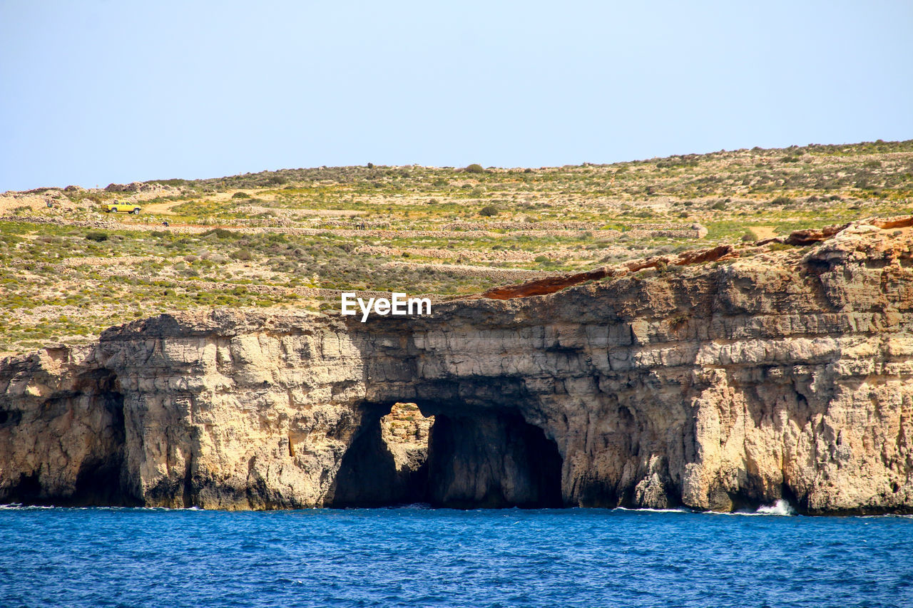 Scenic view of sea against clear sky