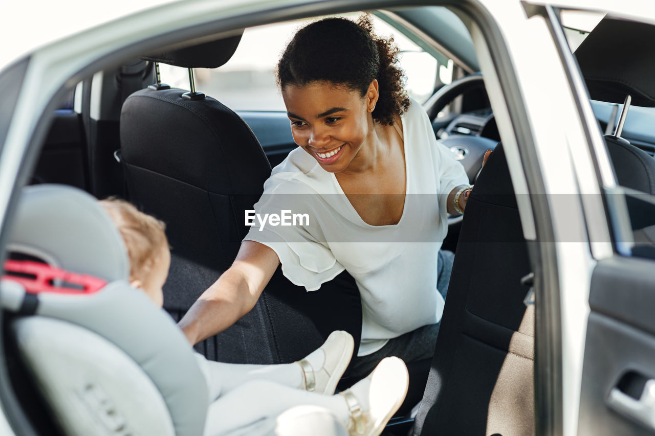 Woman sitting in car