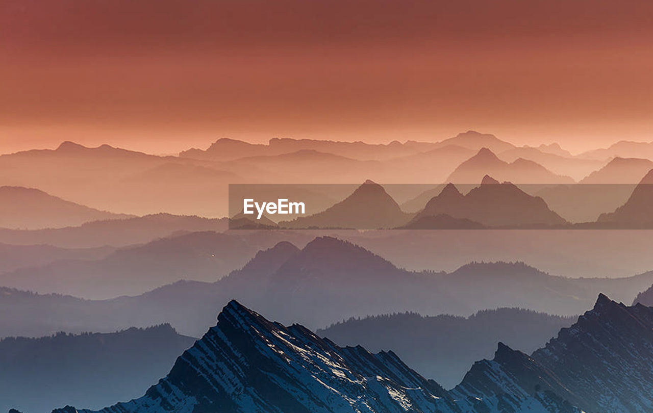 Scenic view of mountains during sunset