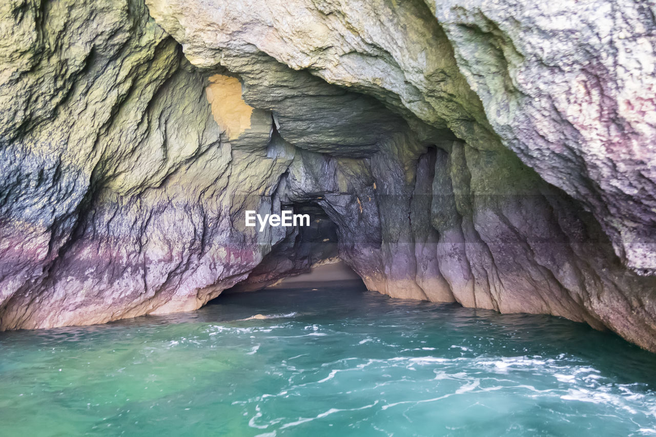 water, sea cave, rock, rock formation, cave, beauty in nature, nature, geology, no people, scenics - nature, formation, sea, day, tranquility, physical geography, non-urban scene, outdoors, natural arch, land, waterfront, tranquil scene, idyllic, eroded, cliff