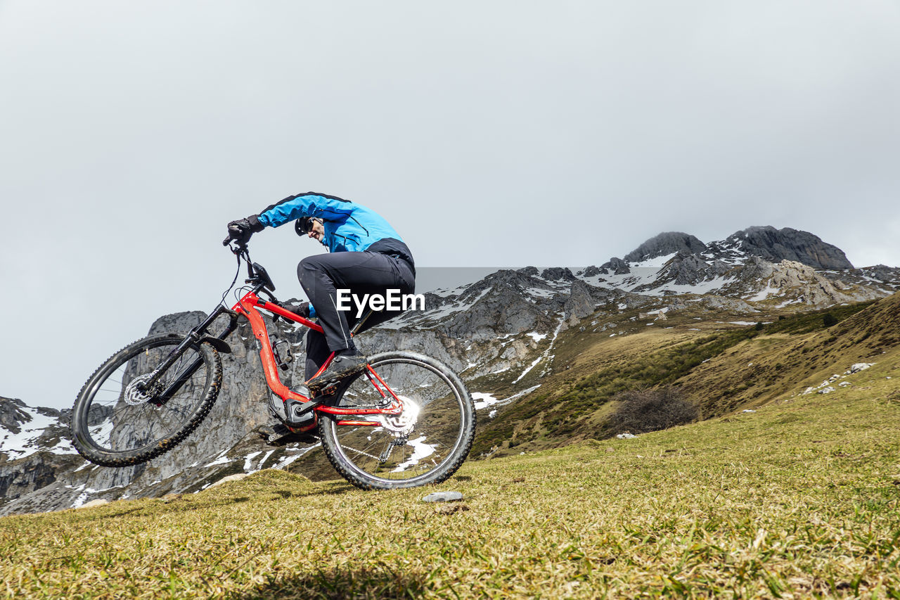 Cyclist man riding mountain bike
