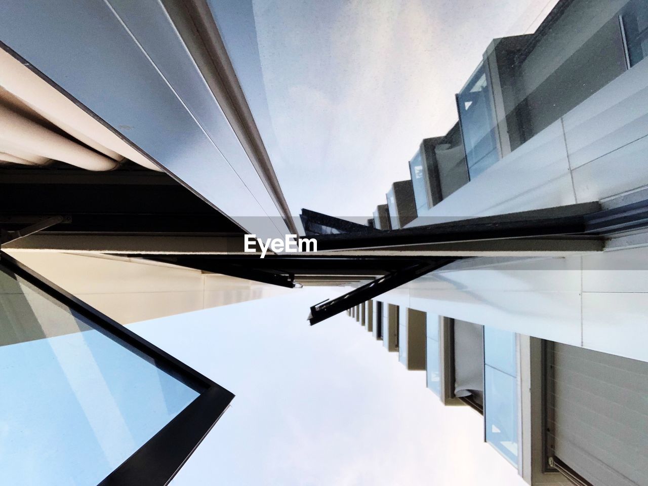 Low angle view of modern building against sky