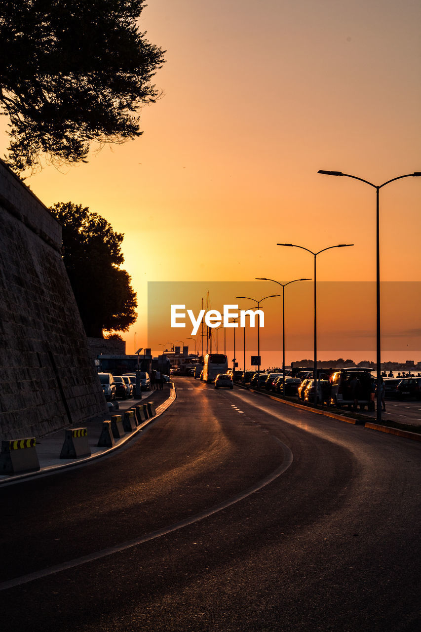 STREET AGAINST SKY DURING SUNSET
