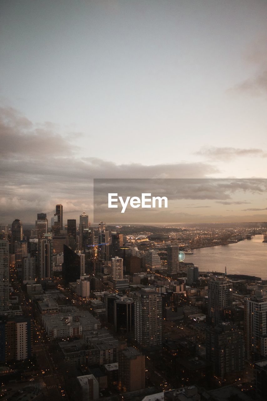 High angle view of buildings in city against sky