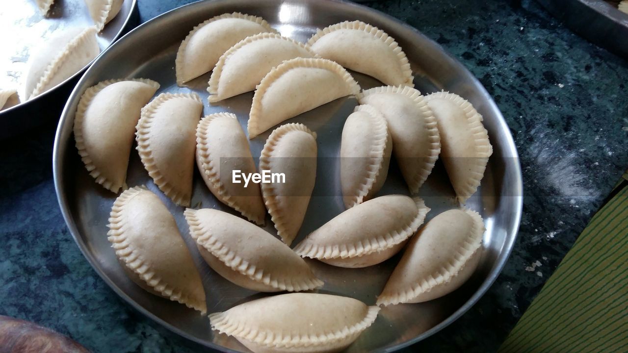 Close-up of gujiyan in plate