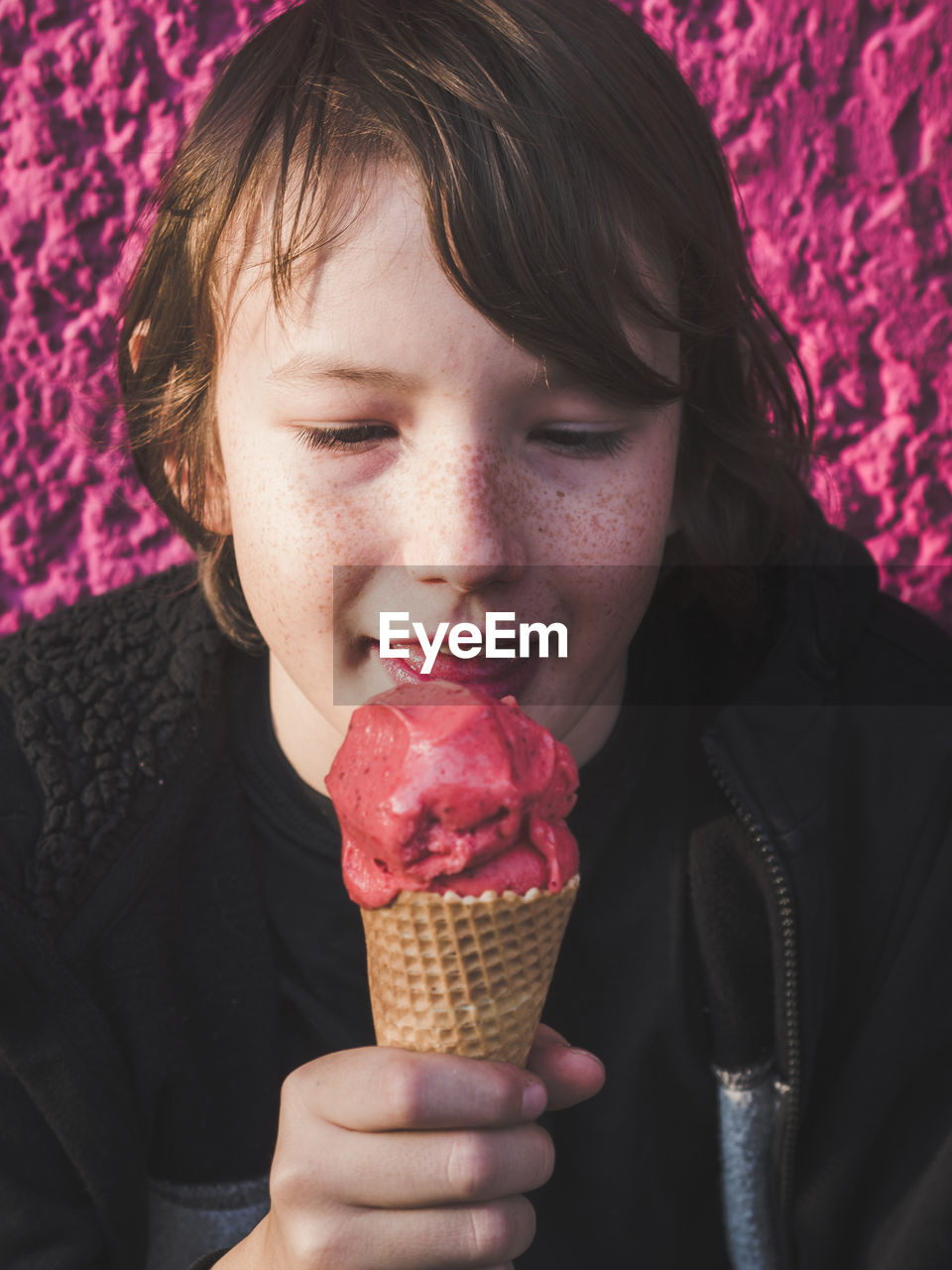 Close-up of boy eating ice cream