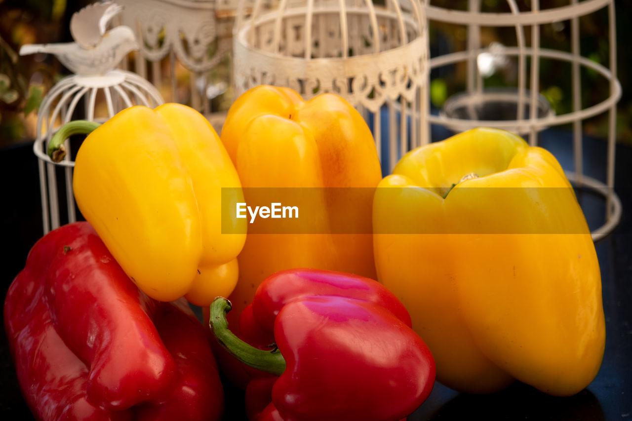 CLOSE-UP OF YELLOW BELL PEPPERS FOR SALE