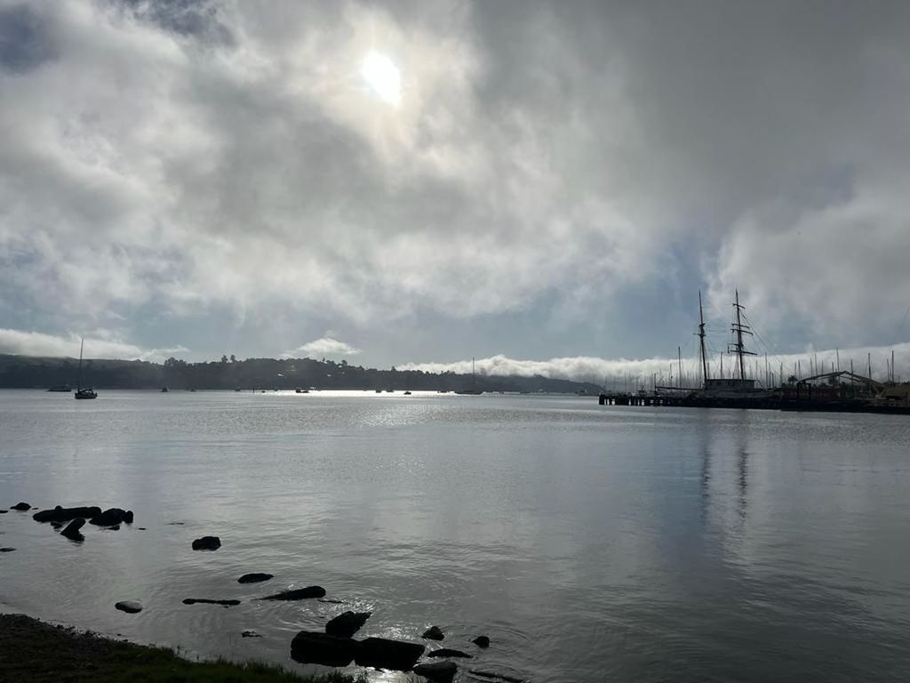 water, cloud, sky, reflection, sea, environment, nature, scenics - nature, beauty in nature, horizon, tranquility, landscape, tranquil scene, no people, shore, mountain, land, travel destinations, overcast, outdoors, dramatic sky, day, beach, transportation, ocean, travel, morning, cloudscape, bay, fog, architecture, coast, body of water, non-urban scene, wave, storm, dusk