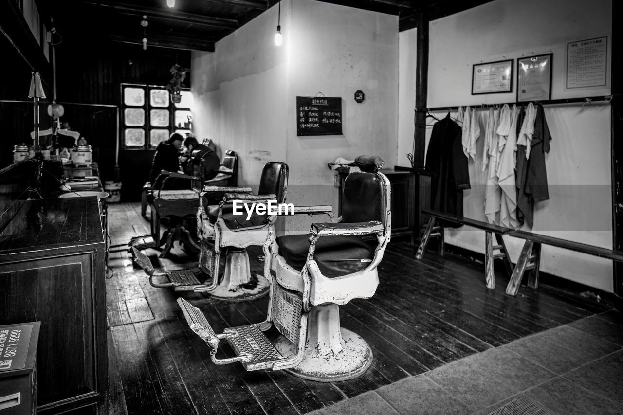 close-up of empty chairs in room