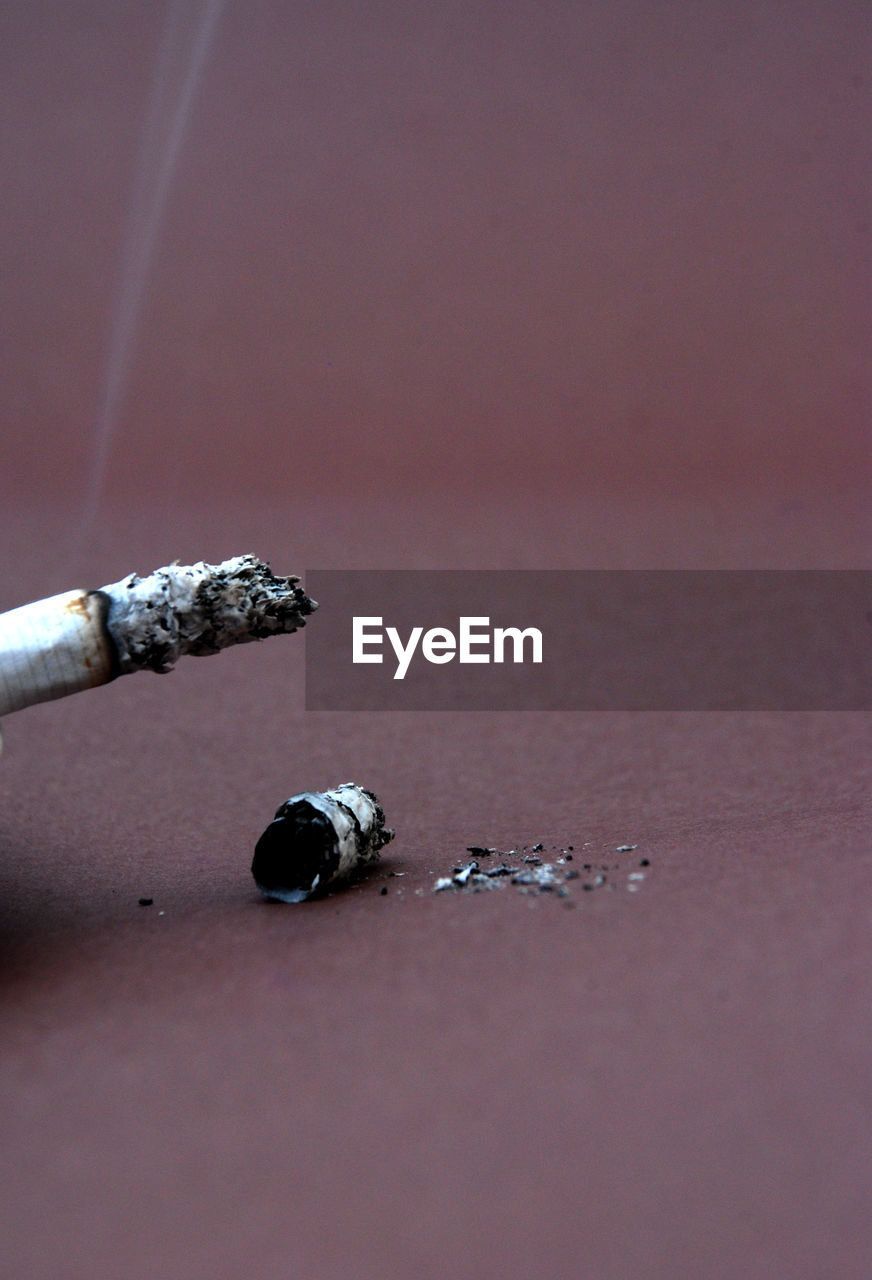 CLOSE-UP OF CIGARETTE