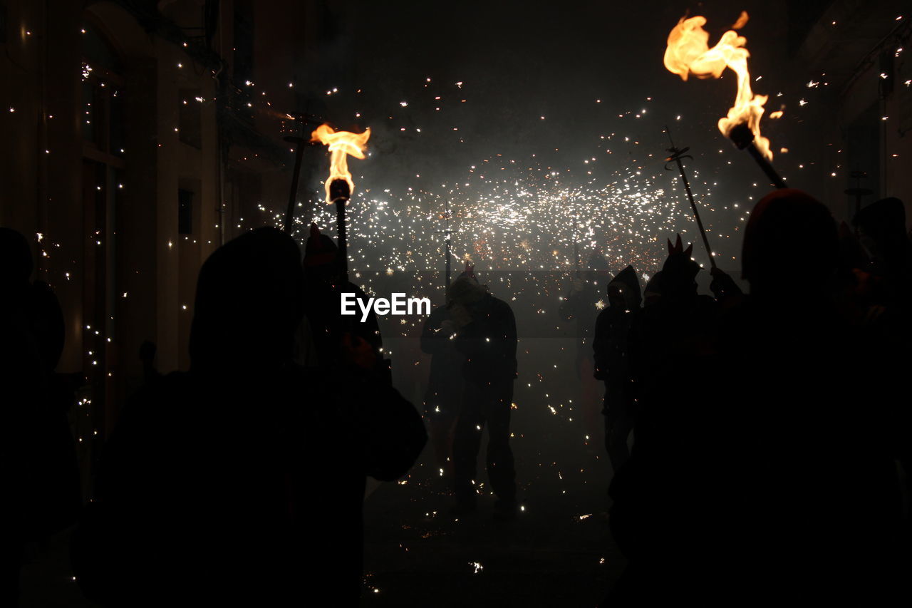 Correfoc parties, typical with firecrackers and lights in the towns