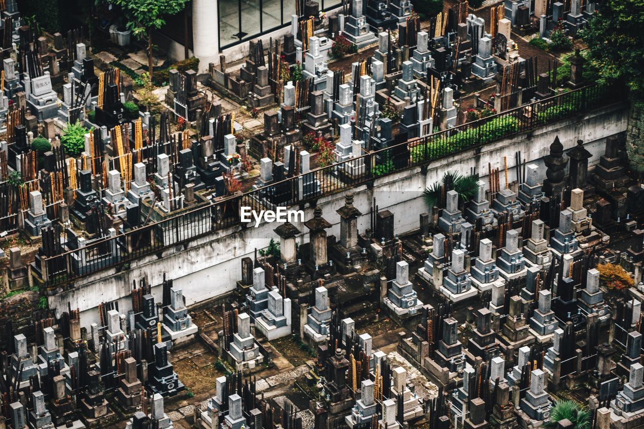 High angle view of tombstones at cemetery