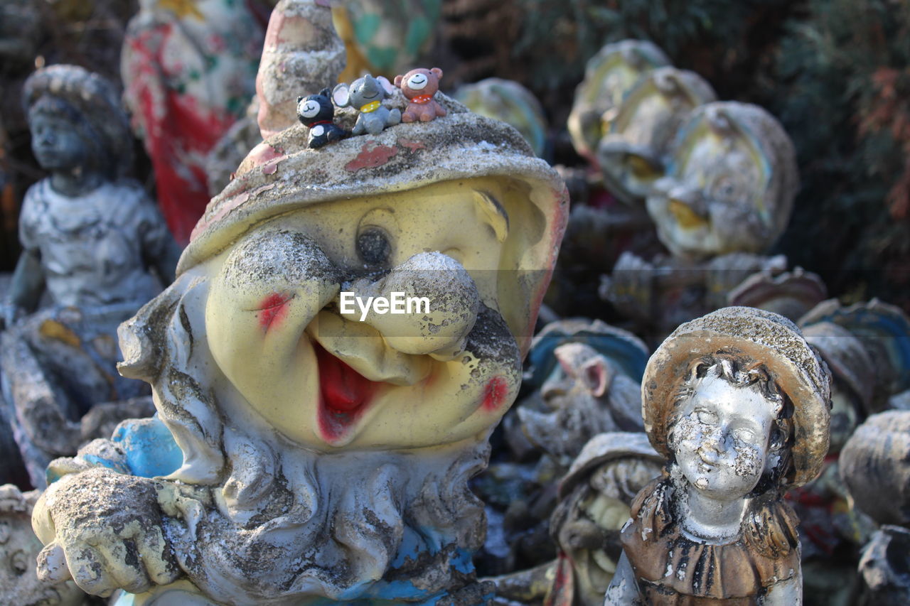 CLOSE-UP OF TOY STATUE