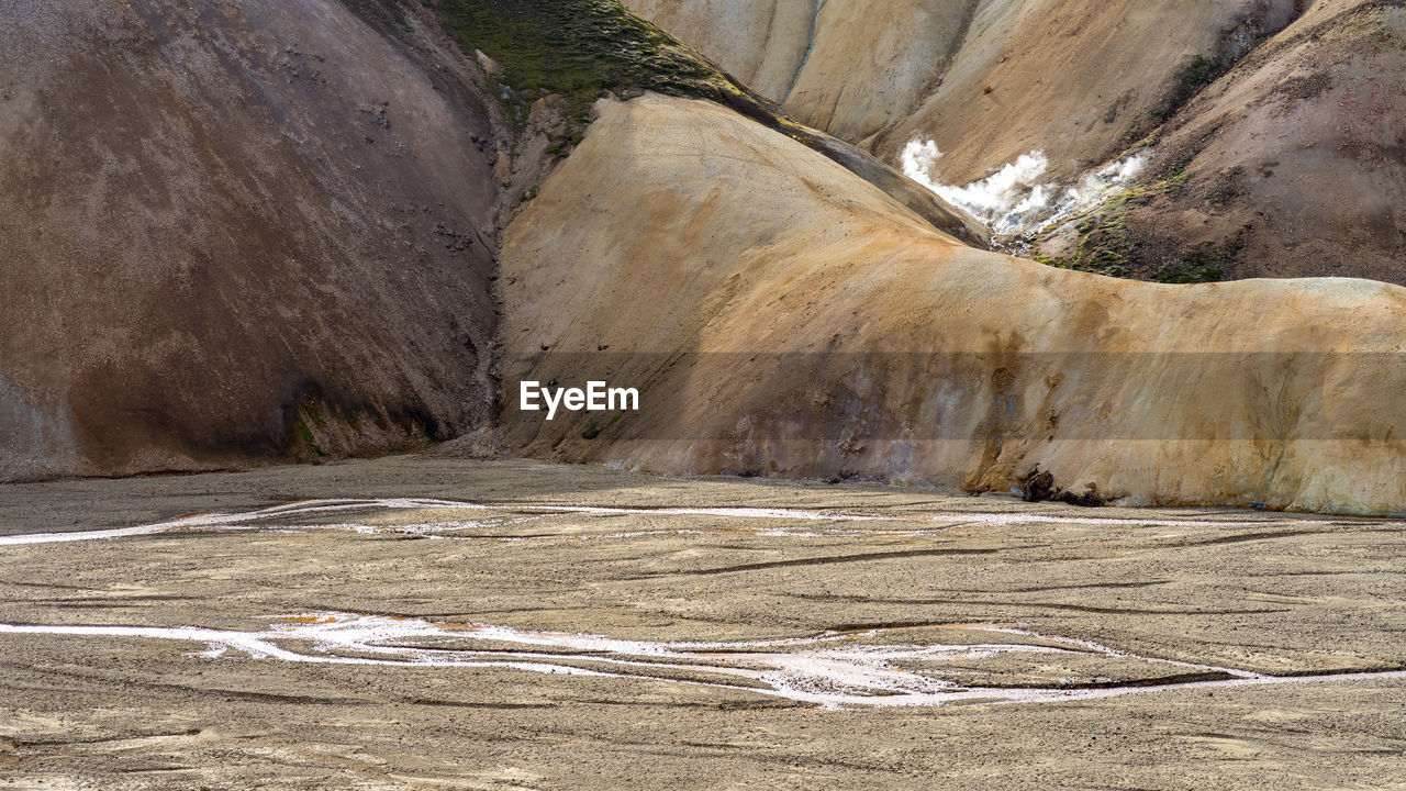 Creeks and sulfur at the volcanic foothills of iceland's highlands