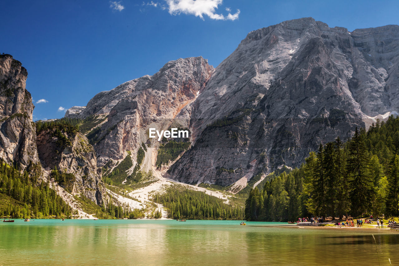 Scenic view of lake with mountain in background