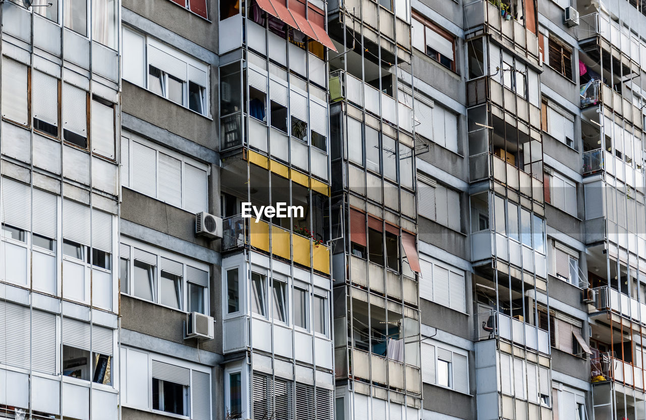 Exterior of old apartment building, balcony, architecture, urban, residential.