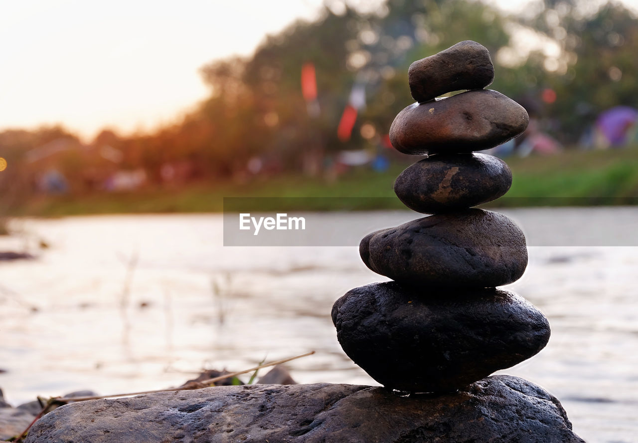 CLOSE-UP OF STONE STACK ON ROCKS