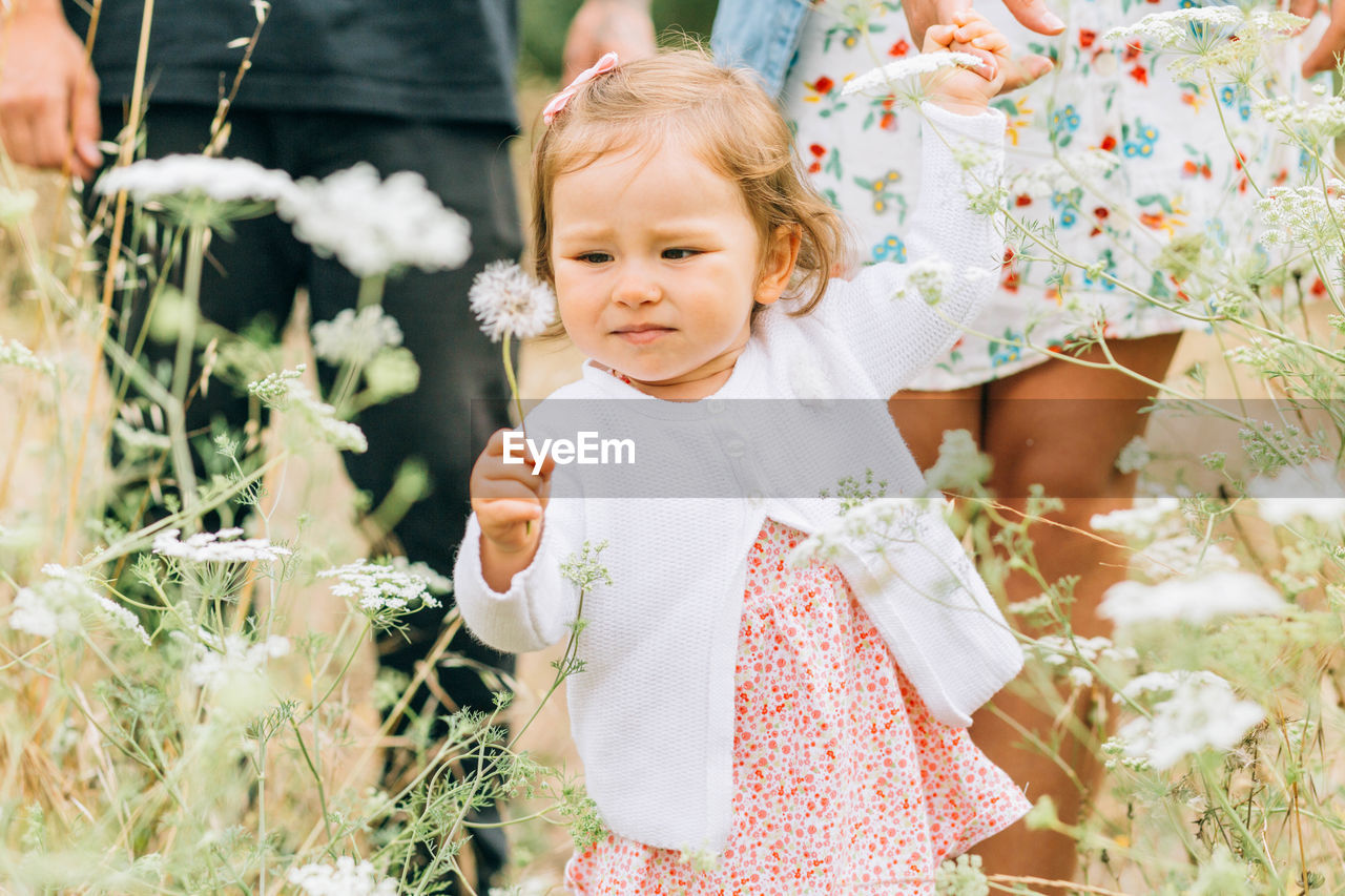 Portrait of cute girl walking outdoors