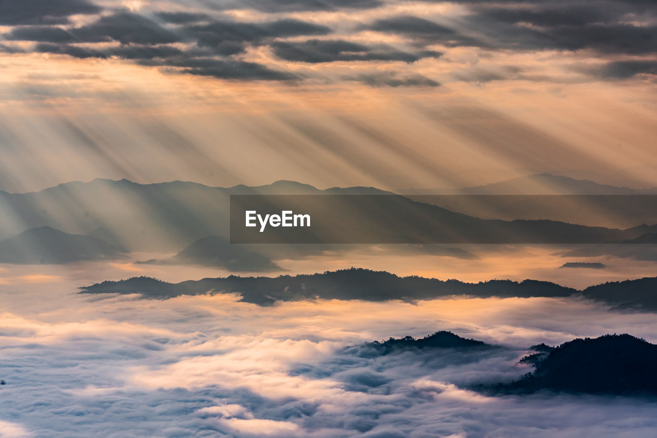 Low angle view of dramatic sky during sunset