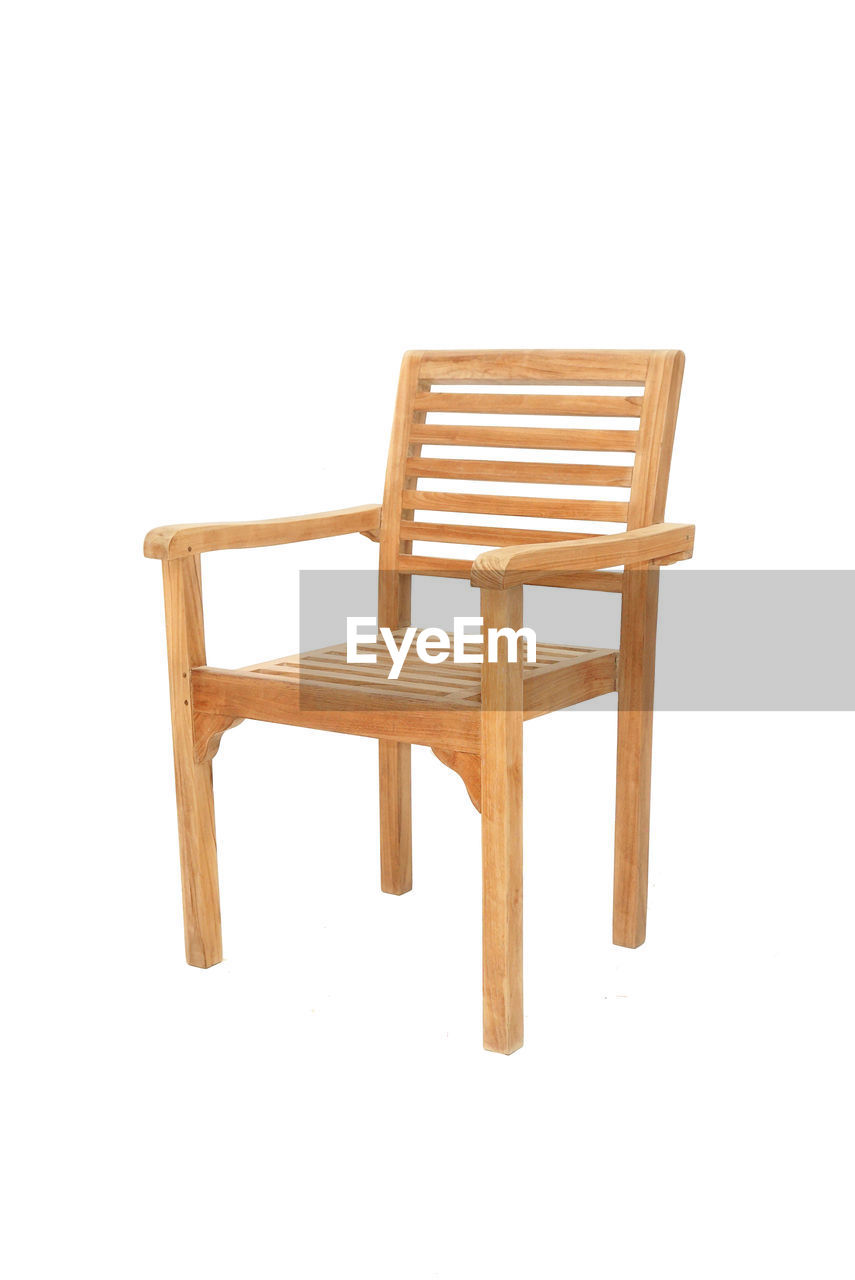 VIEW OF WOODEN CHAIRS AGAINST WHITE BACKGROUND