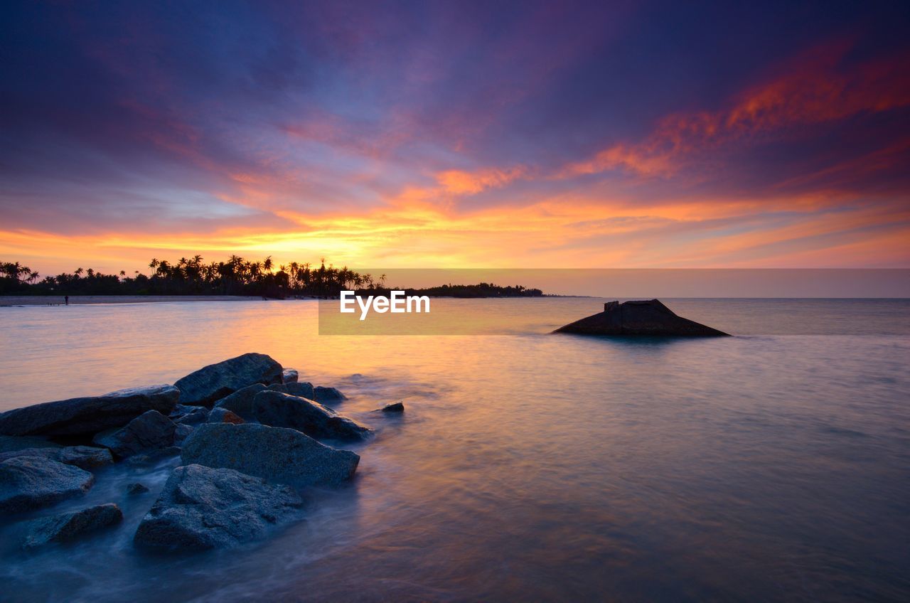 Scenic view of sea against sky during sunset