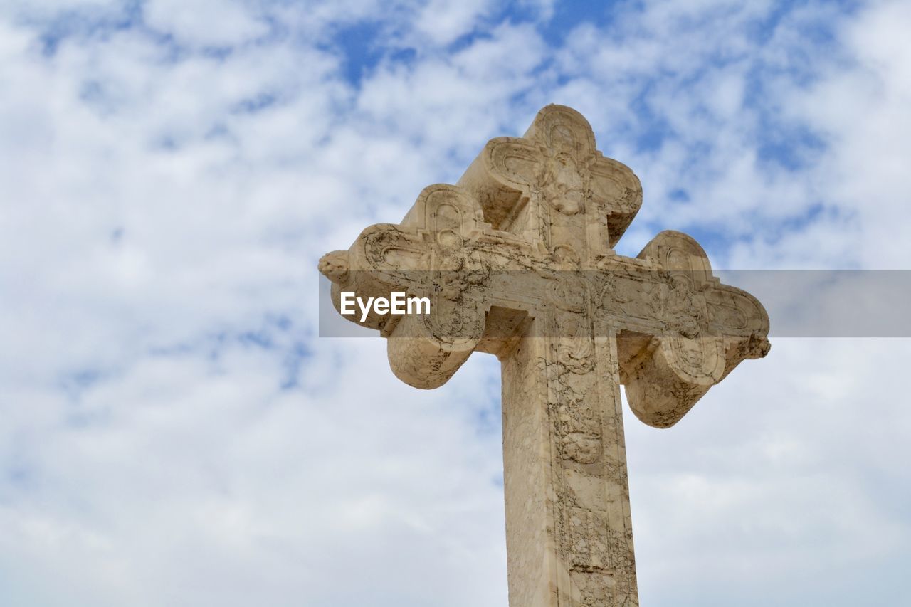 Low angle view of a religious cross 