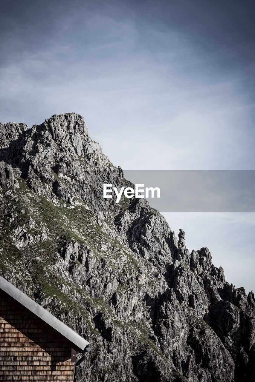 Low angle view of rocks against sky