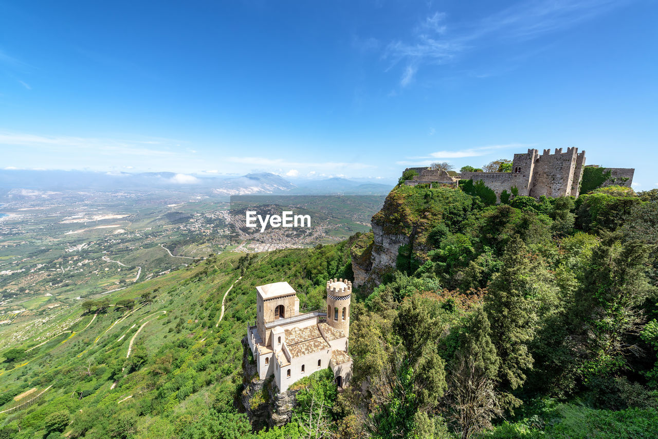 Aerial view of forts on mountains against blue sky