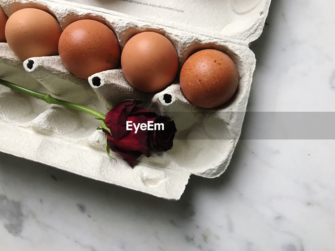 egg, food, food and drink, freshness, healthy eating, egg carton, wellbeing, animal egg, no people, still life, raw food, indoors, high angle view, fragility, ingredient, container, organic, easter egg, eggshell, egg yolk, studio shot, group of objects, box, shell, easter, nature