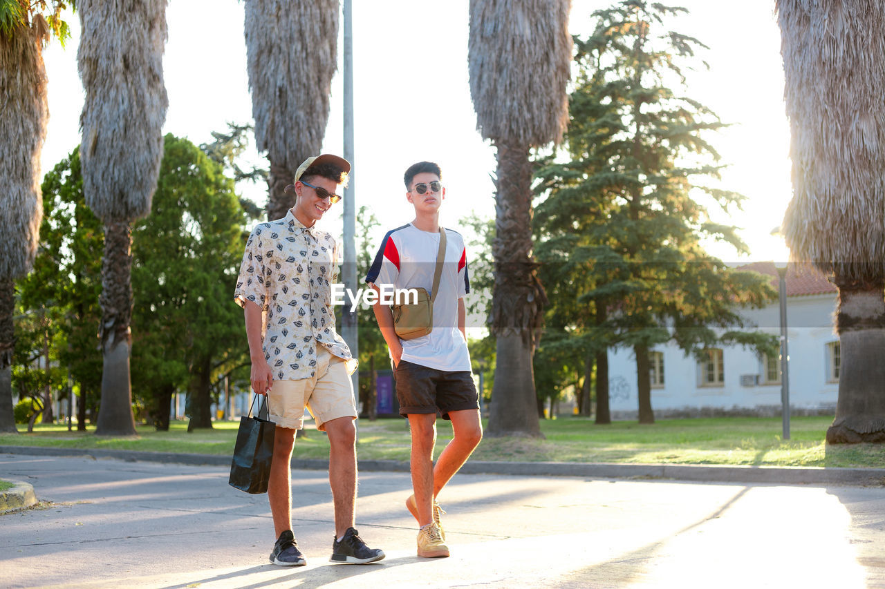 Two friends walking on the streets