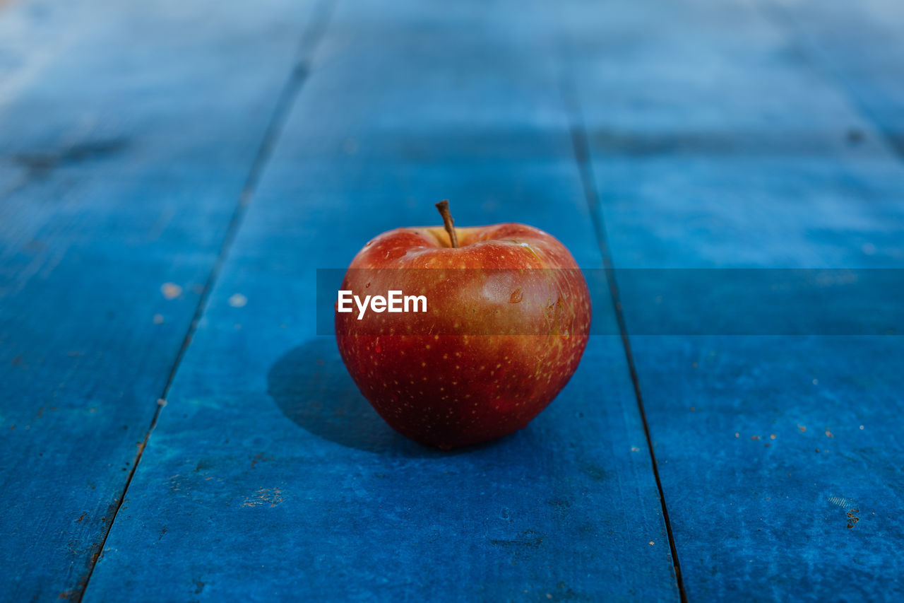 High angle view of apple on table