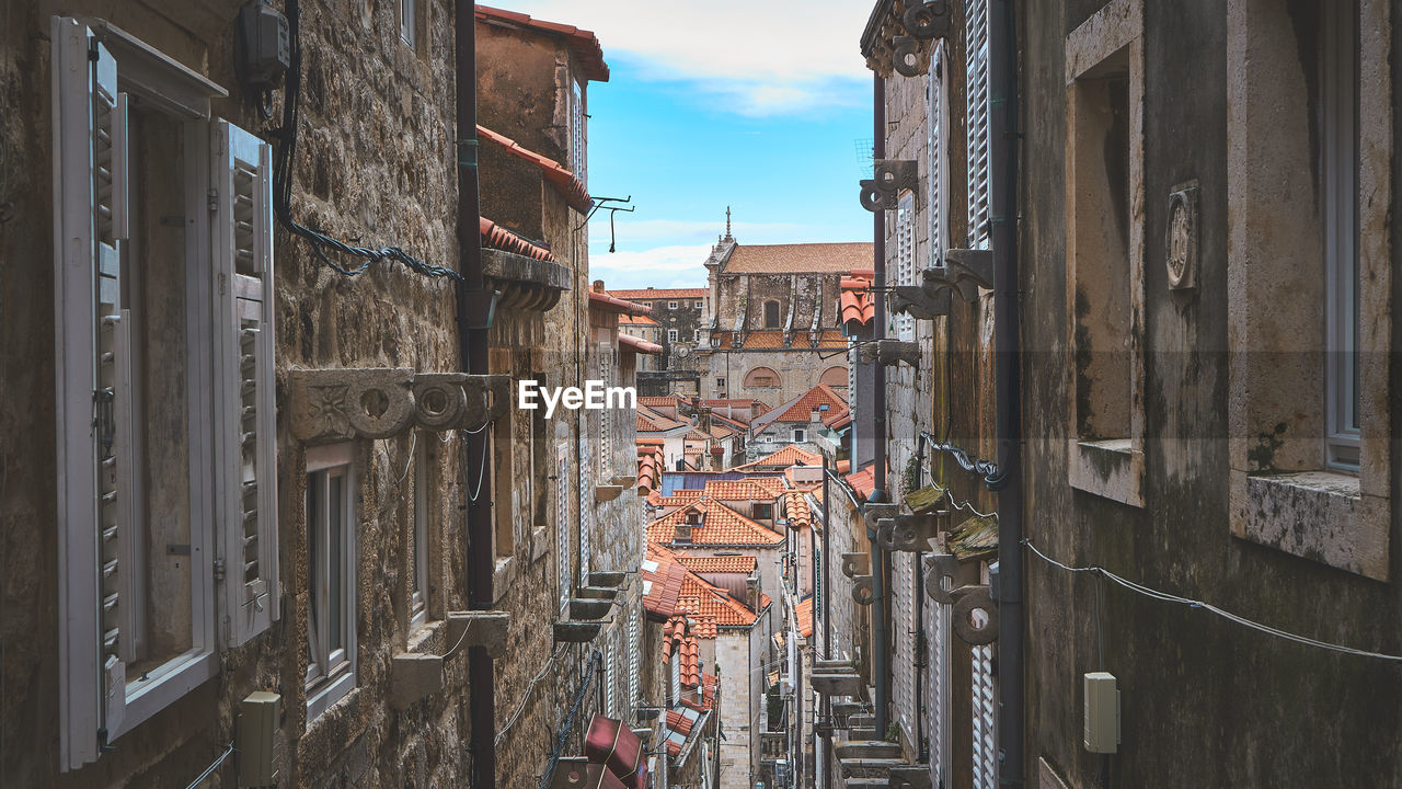 High angle view of street amidst buildings in city