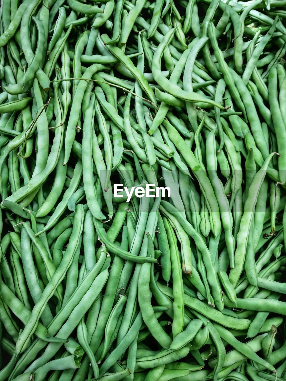 green, food and drink, food, full frame, backgrounds, large group of objects, wellbeing, vegetable, freshness, cowpea, healthy eating, produce, common bean, market, abundance, green bean, for sale, no people, retail, plant, still life, market stall, high angle view, heap, raw food, organic, business, close-up, bean