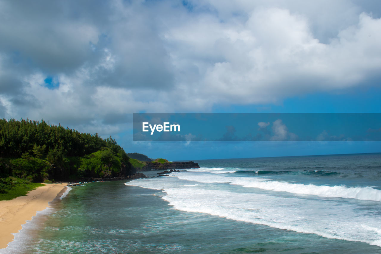 scenic view of sea against cloudy sky