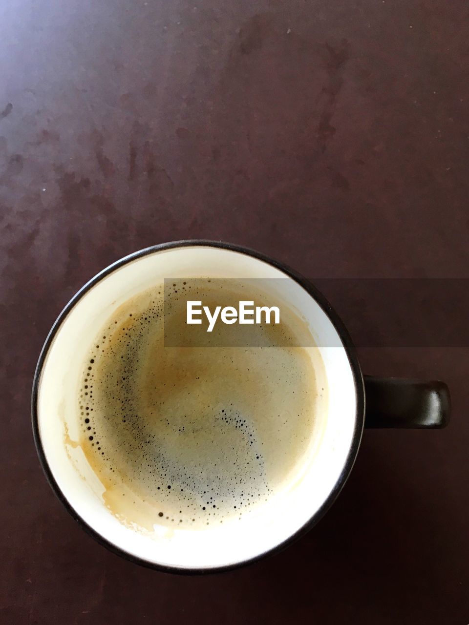 HIGH ANGLE VIEW OF COFFEE CUP