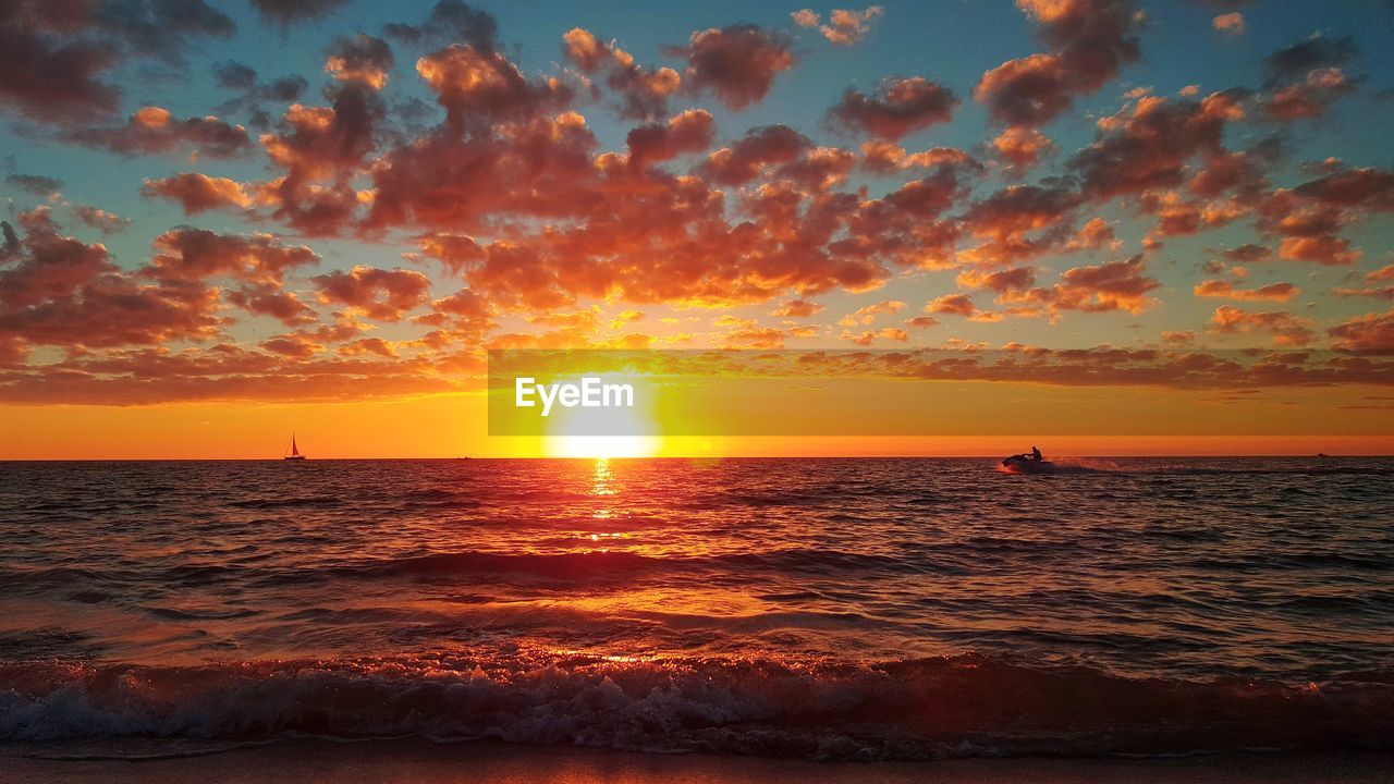 Scenic view of sea against sky during sunset