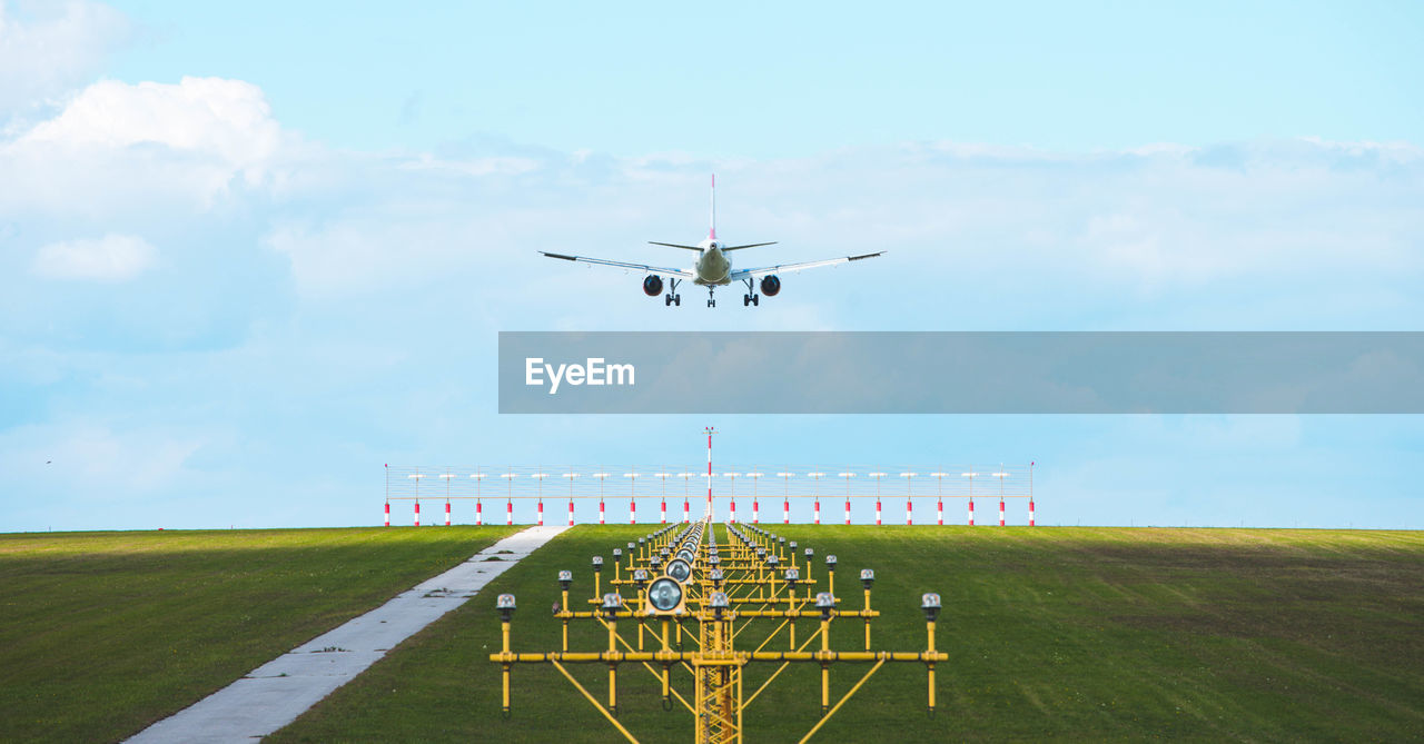 Panoramic view of airplane flying in sky