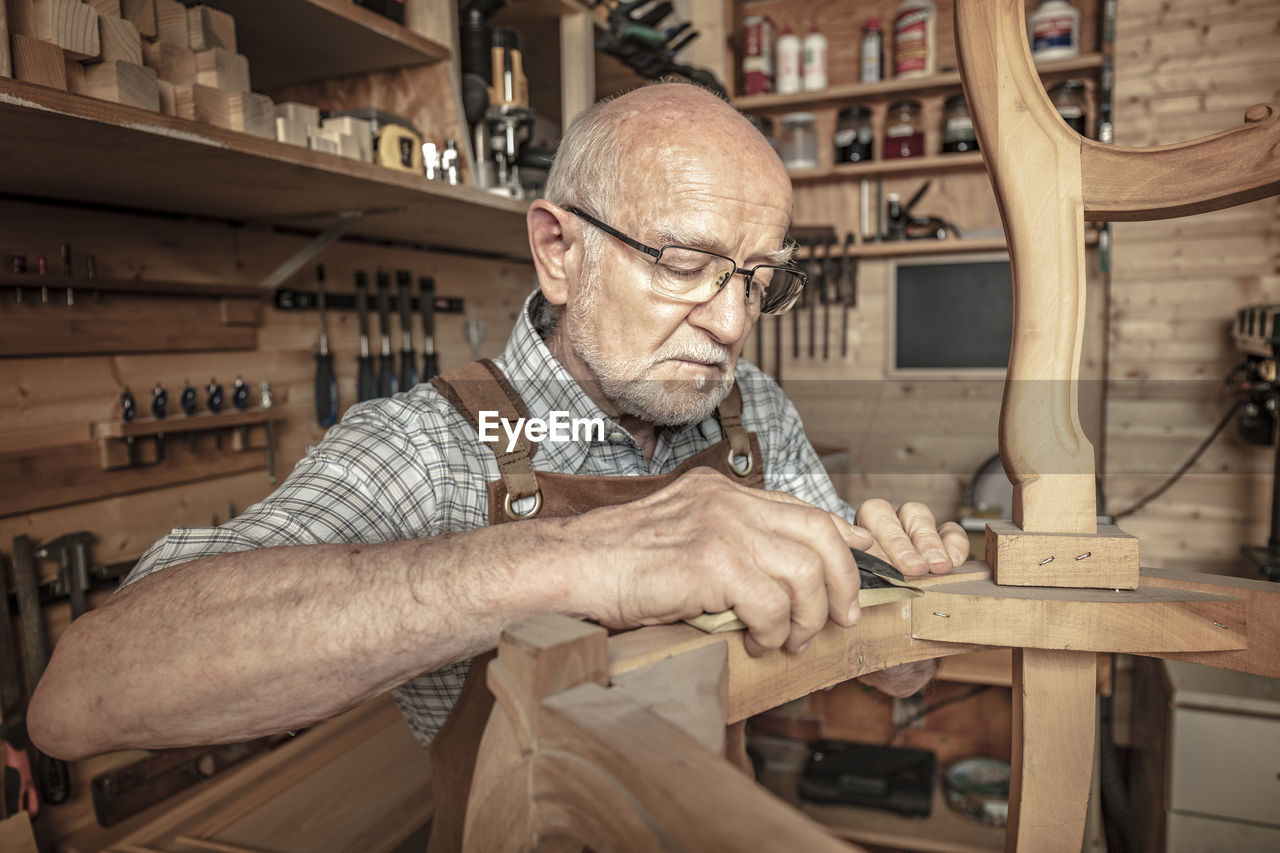 Man working on wood