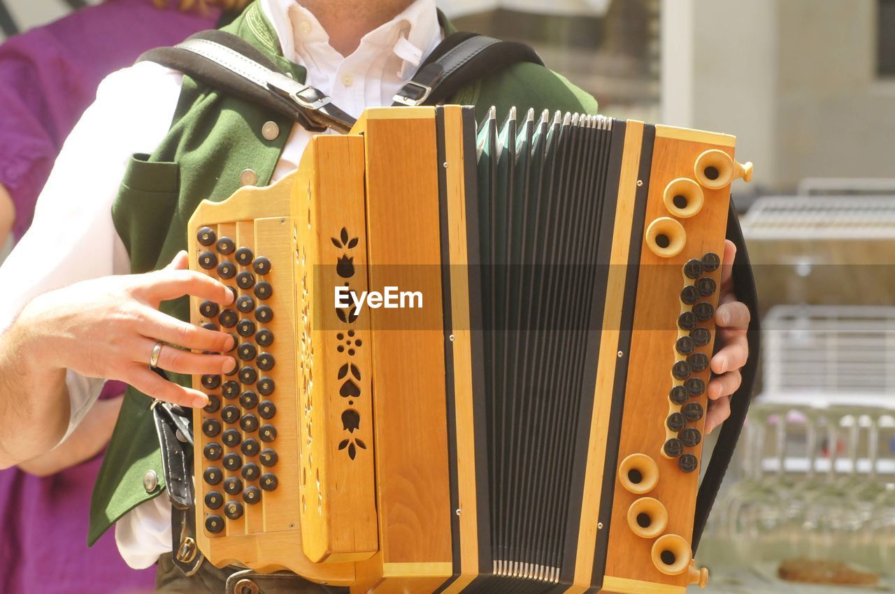A harmonica or accordion musical instrument in traditional folk music