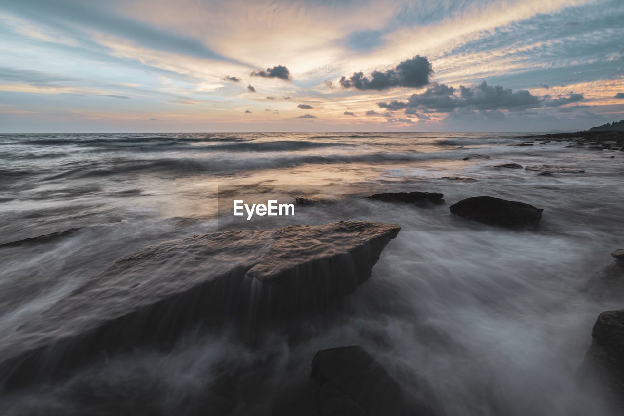 Scenic view of sea against sky during sunset