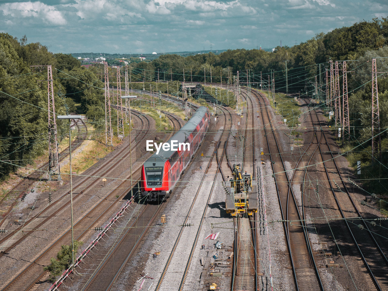 High angle view of train on railroad tracks against sky