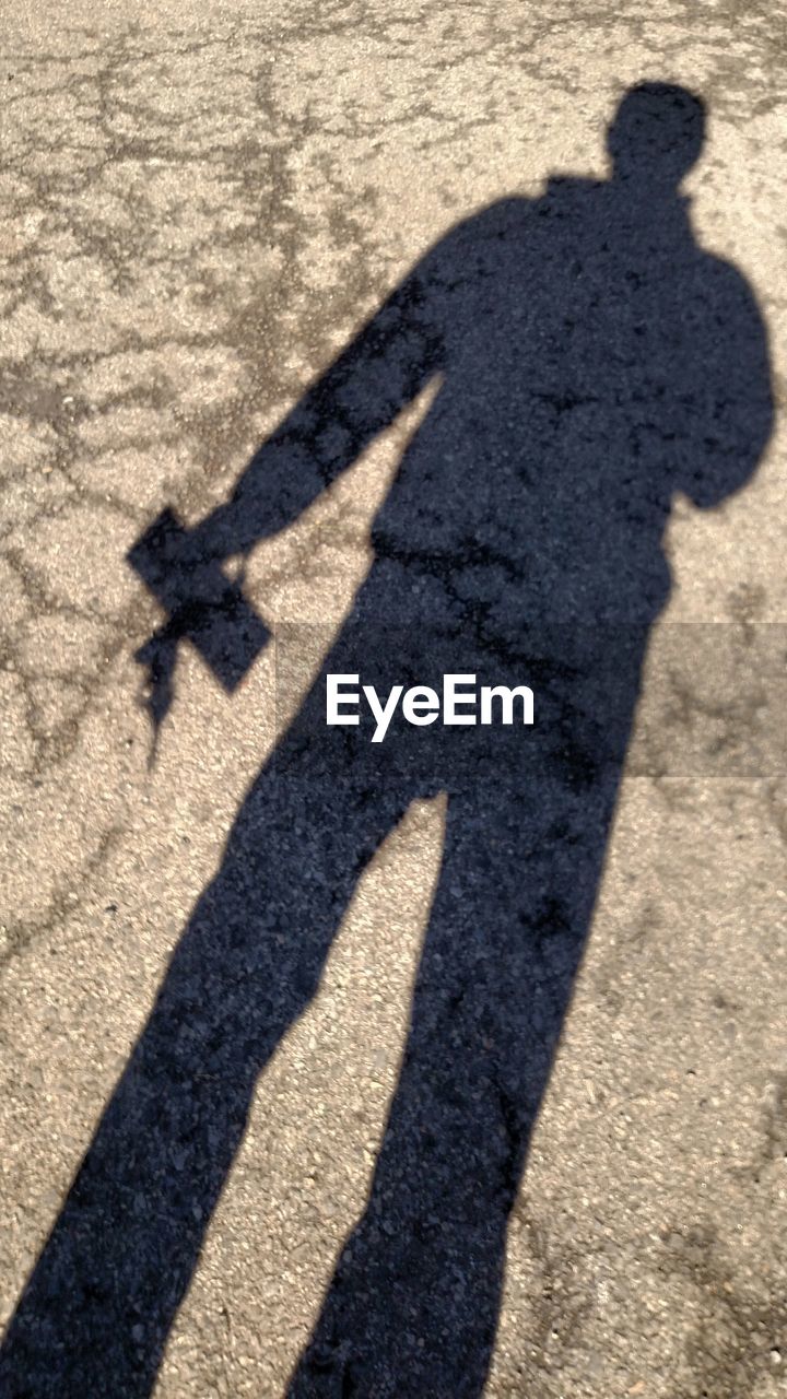 Shadow of a man on the ground