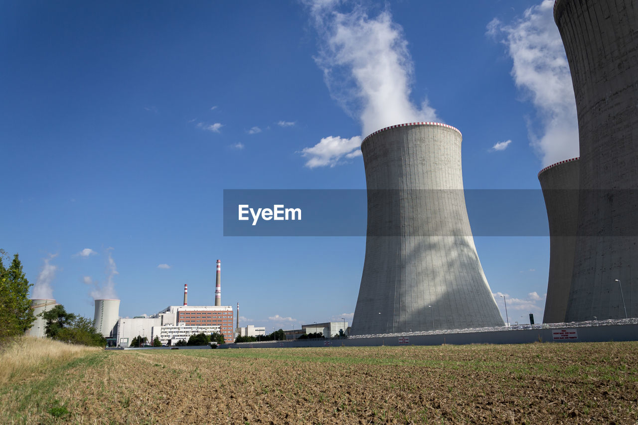 Cooling towers at nuclear power plant, energy self-sufficiency, greenhouse emission reduction
