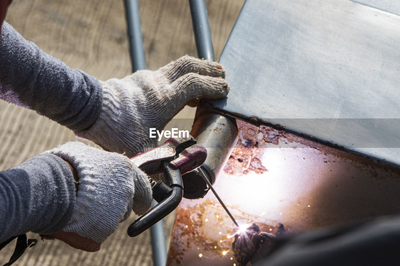 Welder working on a factory