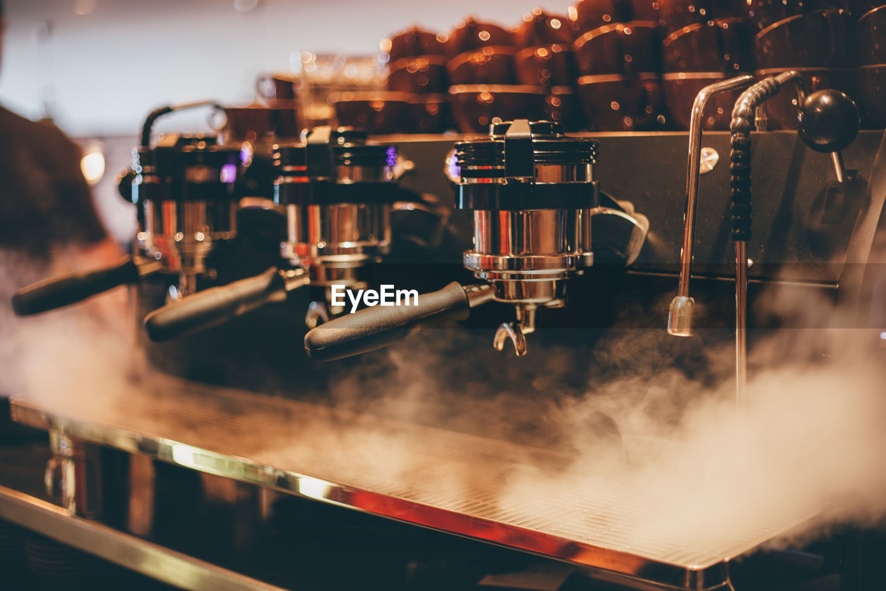 Close-up of steam emitting from espresso maker